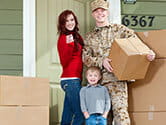 A military family begins moving into their new home