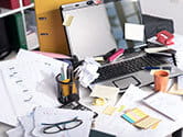 View of a cluttered and messy home office desk