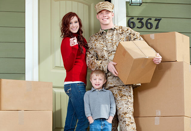 A military family begins moving into their new home