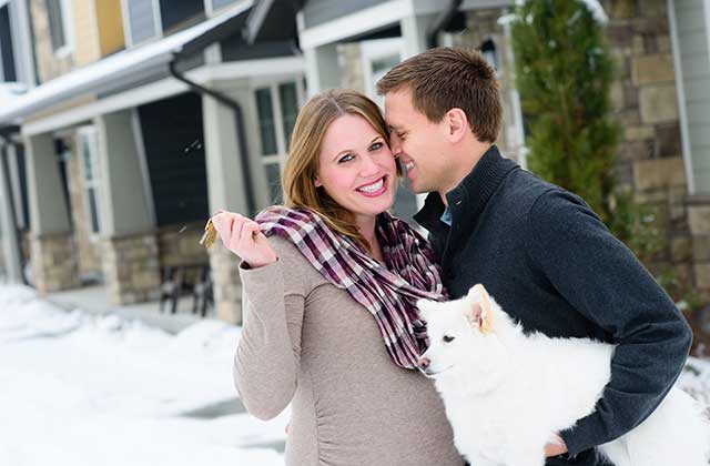 A couple gets the keys to their new home during winter and are moving during the holidays.