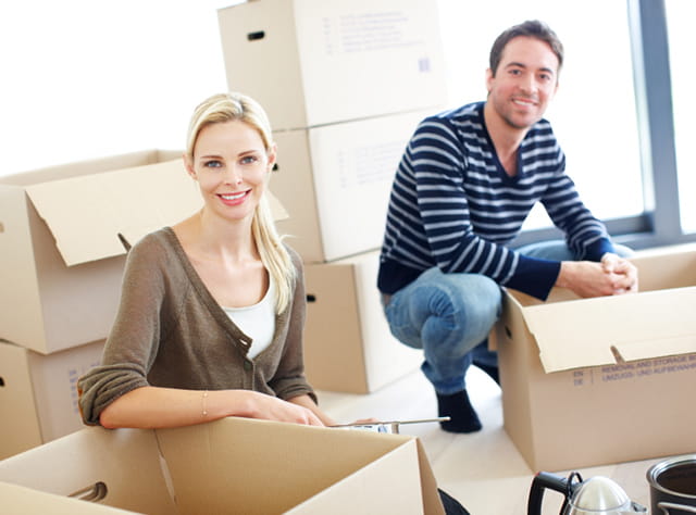 couple with moving boxes