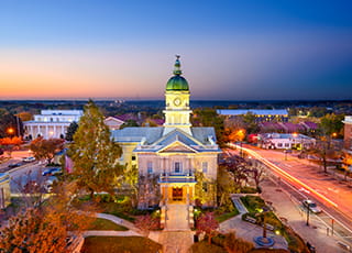 A city government building at dusk