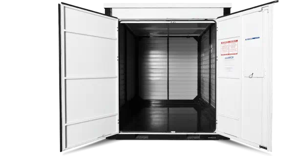 A view of a 1-800-PACK-RAT container interior with empty space and the doors open