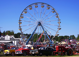 Store fair and festival materials in portable storage containers