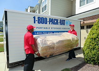 Hire-A-Helper professional laborers help load 1-800-PACK-RAT container