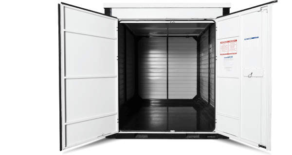 A view of a 1-800-PACK-RAT container interior with empty space and the doors open