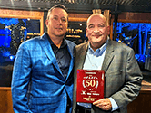 1-800-PACK-RAT representatives accept TBJ Fast 50 award